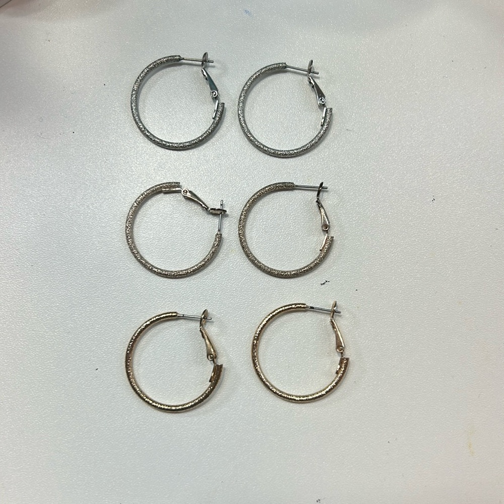 The loft. Set of three earrings.